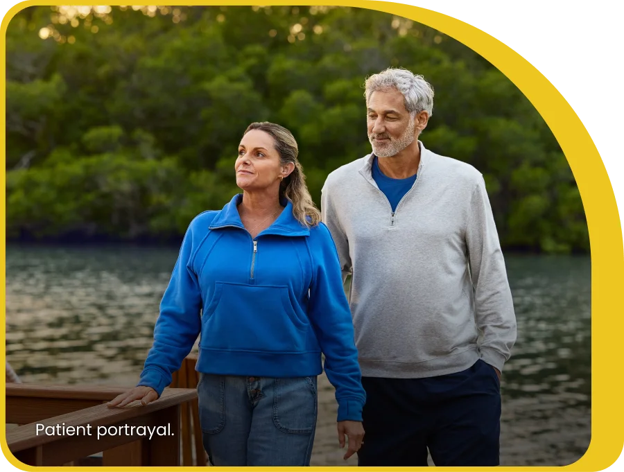 patient couple together on a dock